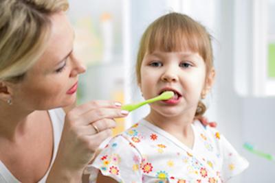 Girl brushing teeth | Dental Fillings Santa Monica